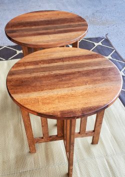 Pair of round oak side tables-multi colored